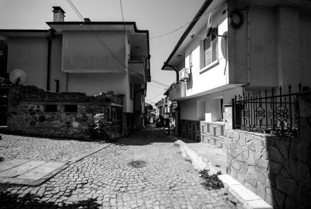 SOZOPOL, BULGARIA - AUGUST 24, 2017: Narrow streets of an ancient seaside town on the southern Bulgarian Black Sea Coast. Black and white.のeditorial素材
