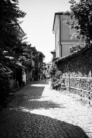 SOZOPOL, BULGARIA - AUGUST 24, 2017: Narrow streets of an ancient seaside town on the southern Bulgarian Black Sea Coast. Black and white.のeditorial素材