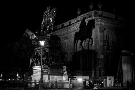 BERLIN - OCTOBER 08, 2017: Equestrian statue of Frederick the Great on Unter den Linden in the evening illumination. Black and white.のeditorial素材