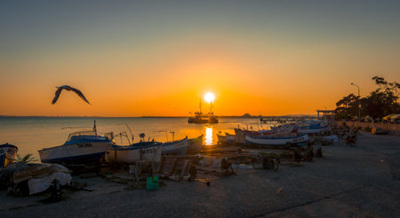 POMORIE, BULGARIA - AUGUST 26, 2017: View of the water area and the fishing boats of the seaport of the seaside resort town of Pomorie.のeditorial素材
