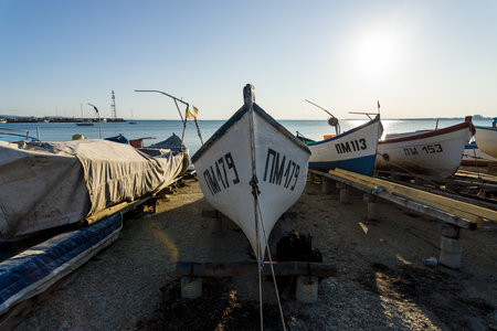 POMORIE, BULGARIA - AUGUST 26, 2017: Fishermen's boats stand on the shore of the seaport of the seaside resort town of Pomorie.のeditorial素材