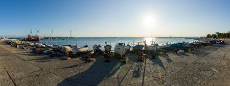 POMORIE, BULGARIA - AUGUST 26, 2017: Panoramic view of the water area and the fishing boats of the seaport of the seaside resort town of Pomorie.のeditorial素材