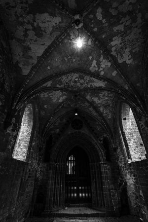 CHORIN, GERMANY - OCTOBER 02, 2017: An old, unrestored part of Chorin Abbey. Cistercian abbey near the village of Chorin in Brandenburg. Founded in 1258. Black and white.のeditorial素材