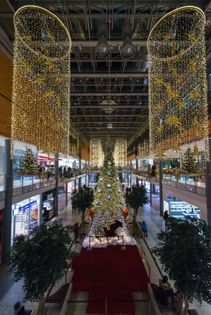 BERLIN - DECEMBER 18, 2017: Arkaden - new and modern shopping mall at Potsdamer Platz in the Christmas illumination.のeditorial素材