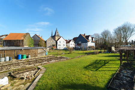 NEUSTADT (HESSE), GERMANY - FEBRUARY 18, 2018: Typical architecture and buildings in the old town. Private gardens in the foreground.のeditorial素材