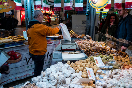STUTTGART, GERMANY - MARCH 04, 2017: Point of sale (Vita-Italiana) of Italian delicacies (sweets and cakes) at the central railway station.のeditorial素材