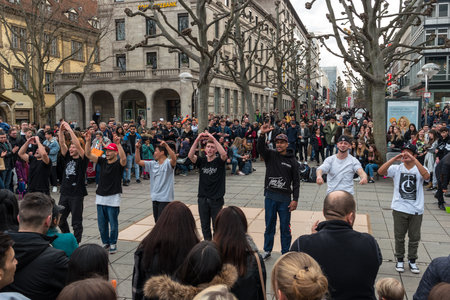 STUTTGART, GERMANY - MARCH 04, 2017: Performance of a street youth dance group on the central historical street Koenigstrasse (King Street).のeditorial素材