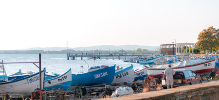 POMORIE, BULGARIA - AUGUST 26, 2017: View of the water area and the fishing boats of the seaport of the seaside resort town of Pomorie.のeditorial素材
