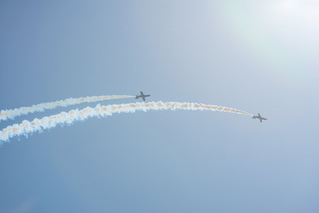 BERLIN, GERMANY - APRIL 28, 2018: Demonstration flight by the aerobatic team Patrulla Aguila (Eagle Patrol). Exhibition ILA Berlin Air Show 2018.のeditorial素材