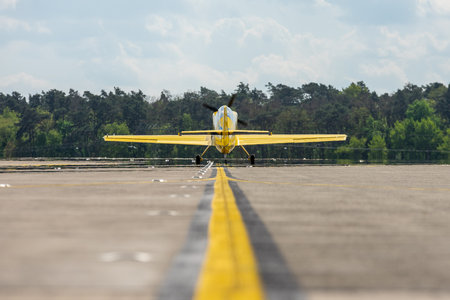 BERLIN, GERMANY - APRIL 27, 2018: Aerobatic aircraft and glider tug Akaflieg Munchen Mu30 Schlacro on the airfield. Exhibition ILA Berlin Air Show 2018のeditorial素材