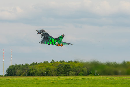 BERLIN, GERMANY - APRIL 27, 2018: Multirole fighter Eurofighter Typhoon on the runway. Exhibition ILA Berlin Air Show 2018のeditorial素材