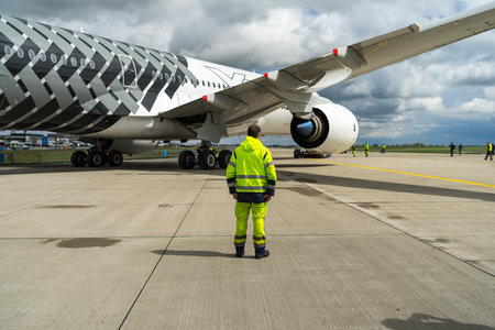 BERLIN, GERMANY - APRIL 26, 2018: Fragment of wide-body jet airliner Airbus A350 XWB on the taxiway. Exhibition ILA Berlin Air Show 2018のeditorial素材