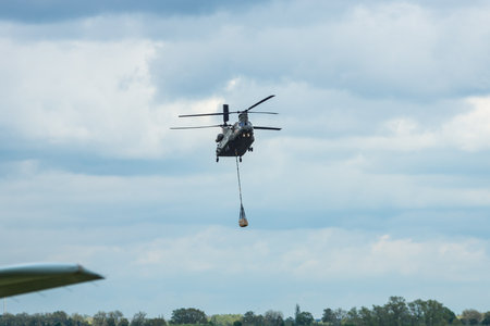 BERLIN, GERMANY - APRIL 26, 2018:  Demonstration flight of transport helicopter Boeing CH-47 Chinook. Royal Air Force. Exhibition ILA Berlin Air Show 2018のeditorial素材