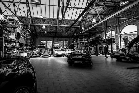 BERLIN - MAY 06, 2018: A workshop for the maintenance and repair of retro cars in the complex of buildings Classic Remise Berlin. Black and white. Oldtimertage Berlin-Brandenburg (31th Berlin-Brandenburg Oldtimer Day).のeditorial素材