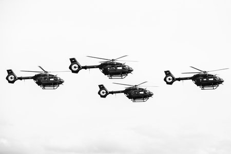 BERLIN, GERMANY - APRIL 27, 2018: Military utility helicopters Airbus Helicopters H145M of the German Air Force. Black and white. Exhibition ILA Berlin Air Show 2018.のeditorial素材