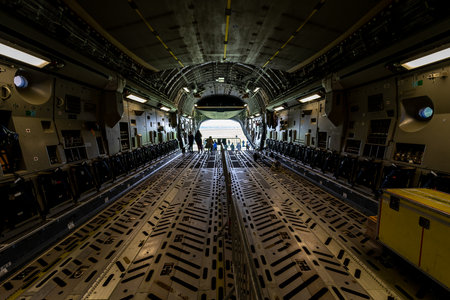 BERLIN, GERMANY - APRIL 27, 2018: The cargo compartment of the strategic and tactical airlifter Boeing C-17 Globemaster III. Exhibition ILA Berlin Air Show 2018.のeditorial素材