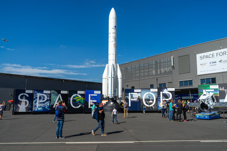 BERLIN - APRIL 28, 2018: Model of the Ariane 6 space rocket by Arianespace in front of the space pavilion. Exhibition ILA Berlin Air Show 2018.のeditorial素材