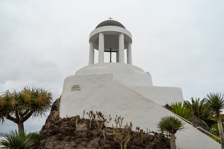 A small chapel of the 18th century - Tempel El Penon del Fraile on top of a volcanic lump. Puerto de la Cruz, Tenerife. Canary islands, Spain.の写真素材