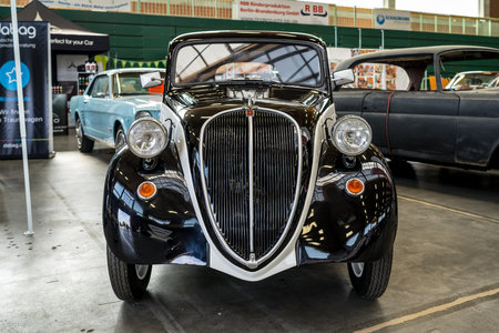 PAAREN IM GLIEN, GERMANY - MAY 19, 2018: Compact car Fiat 500 Topolino, 1939. Die Oldtimer Show...