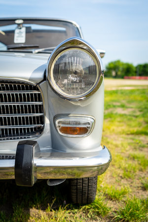 PAAREN IM GLIEN, GERMANY - MAY 19, 2018: Fragment of large family car Peugeot 404 SL, 1968. Die...