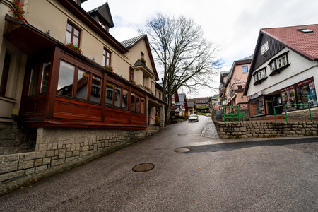 SPINDLERUV MLYN, CZECH REPUBLIC - OCTOBER 24, 2018: Streets and houses of the most frequented mountain and ski resorts in the country.のeditorial素材