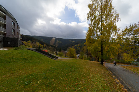 SPINDLERUV MLYN, CZECH REPUBLIC - OCTOBER 24, 2018: Streets and houses of the most frequented mountain and ski resorts in the country.のeditorial素材