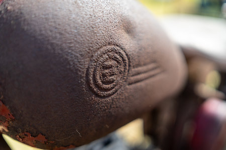PAAREN IM GLIEN, GERMANY - MAY 19, 2018: Rusty fuel tank motorcycle Royal Enfield Bullet. Close-up. Die Oldtimer Show 2018.のeditorial素材