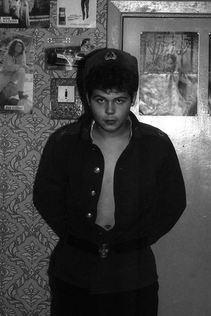 MOSCOW REGION, RUSSIA - CIRCA 1992: Portrait of a russian soldier in an apartment. Film scan. Large grain, circa 1992のeditorial素材