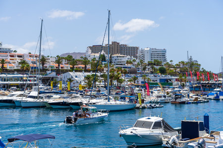 COSTA ADEJE, TENERIFE, CANARY ISLANDS, SPAIN - JULY 26, 2018: Sea port and marina for boats and yachts.のeditorial素材