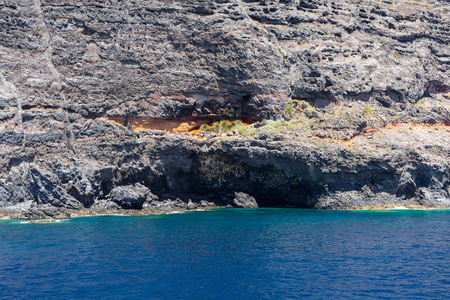 Vertical cliffs Acantilados de Los Gigantes (Cliffs of the Giants). View from Atlantic Ocean. Tenerife. Canary Islands. Spain.の写真素材