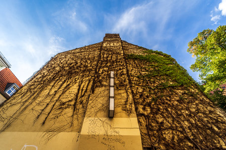 BERLIN - SEPTEMBER 09, 2018: Streets of the historic center of Altstadt Spandau. The facade is covered with ivy.のeditorial素材