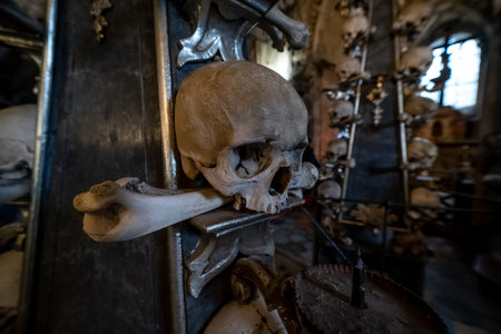 KUTNA HORA, CZECH REPUBLIC - OCTOBER 26, 2018: Detail of interior of Sedlec Ossuary, a small Roman Catholic chapel, located beneath the Cemetery Church of All Saints.のeditorial素材