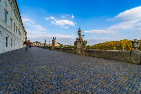 KUTNA HORA, CZECH REPUBLIC - OCTOBER 26, 2018: Pedestrian street (terrace) Barborska and Jesuit College (left).のeditorial素材