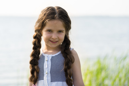Portrait of a beautiful little girl.の写真素材