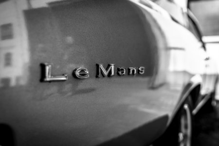 BERLIN - MAY 05, 2018: The emblem of a mid-size car Pontiac LeMans, 1967. Black and white.のeditorial素材