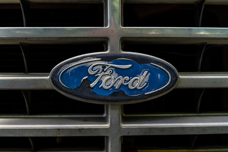 BERLIN - MAY 05, 2018: Ford's shabby emblem, close-up.のeditorial素材
