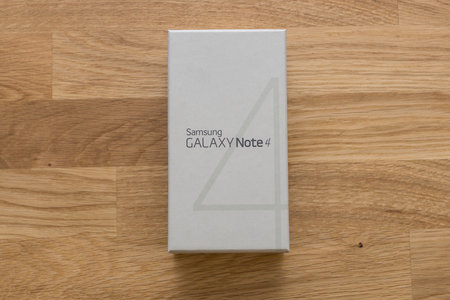 BERLIN - JUNE 10, 2016: Samsung Galaxy Note 4 (SM-N910F). Smartphone with stylus pen. Original card...