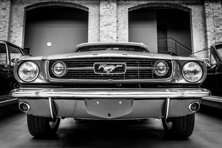 BERLIN - MAY 11, 2019: Pony car Ford Mustang (first generation). Black and white. 32th Berlin-Brandenburg Oldtimer Day.のeditorial素材