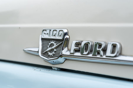 PAAREN IM GLIEN, GERMANY - JUNE 08, 2019: The emblem of full-size pickup truck Ford F-100. Close-up. Die Oldtimer Show 2019.のeditorial素材