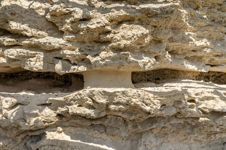 Sandstone. The structure of natural stone. Natural erosion. Background.
