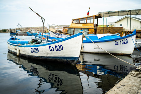 SOZOPOL, BULGARIA - JUNE 28, 2019: Fishing boats at the seaport are at the pier.のeditorial素材