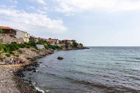 Houses, buildings and remains of the old fortress wall of the ancient seaside town of Sozopol. Bulgaria.の写真素材