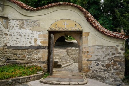 Ancient entrance to the courtyard of the Assumption of the Holy Virgin orthodox church. Plovdiv....