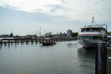 WARNEMUENDE (ROSTOCK), GERMANY - JULY 25, 2019: Pleasure ship in the water area of seaport.のeditorial素材