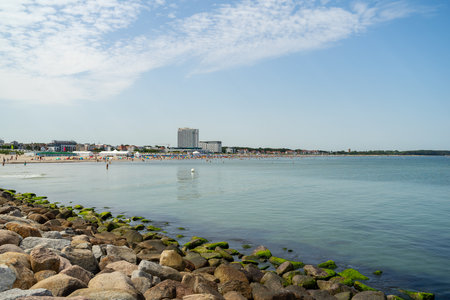 WARNEMUENDE (ROSTOCK), GERMANY - JULY 25, 2019: View of the promenade, beach and vacationersのeditorial素材