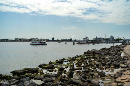 WARNEMUENDE (ROSTOCK), GERMANY - JULY 25, 2019: Pleasure ship in the water area of seaport.のeditorial素材