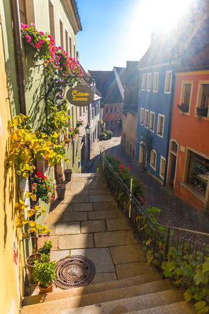MEISSEN, GERMANY - OCTOBER 12, 2019: Beautiful streets of the old town. Stylization. Vintage toning. Lens flare.のeditorial素材