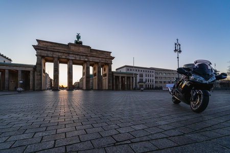 BERLIN - MARCH 22, 2020: Pariser Platz (Paris Square) and Brandenburg Gate. Early morning. Desert area caused by quarantine as a result of coronavirus infection.のeditorial素材