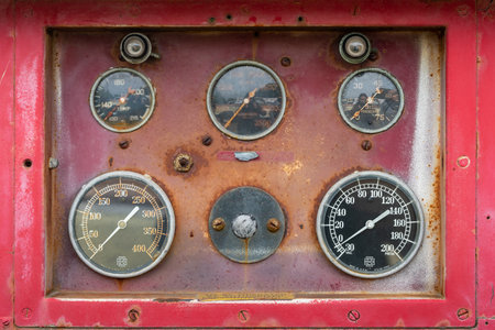 BERLIN - APRIL 27, 2019: Special car - Maxim Fire Truck. Pressure gauges and tachometer and other fire pump monitoring instruments.のeditorial素材