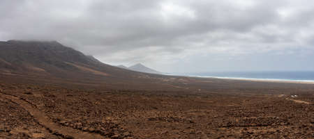 A panoramic view of the desert rocky expanses of the southwestern part of the Jandia Peninsula....